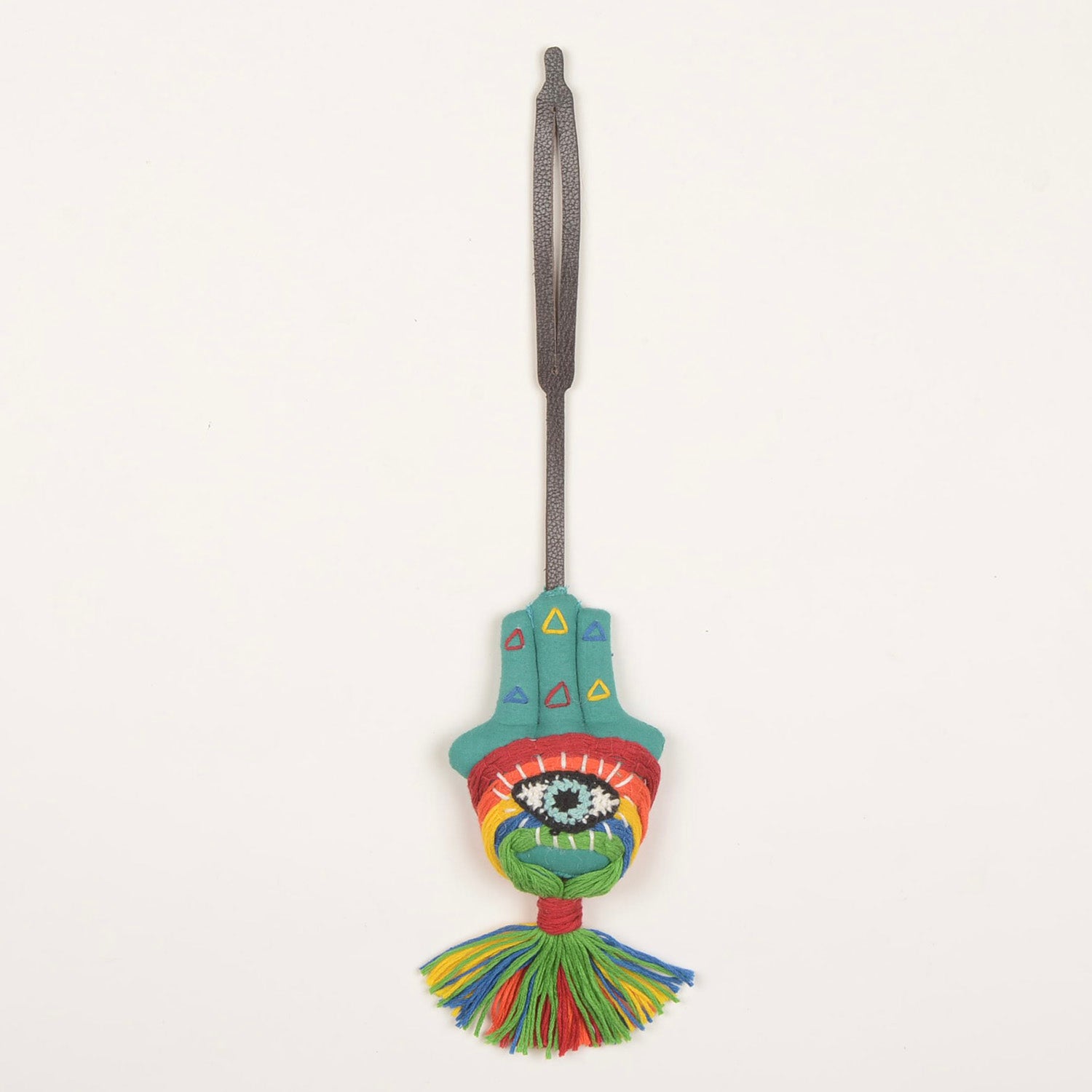 Handcrafted Bag Charm BC_Imaan_01 featuring vibrant waste fabric and a stylish leather strap, made by Hazara artisans.